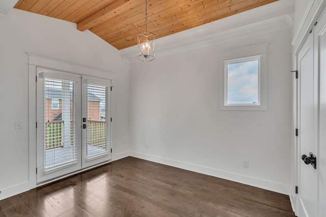 empty room with vaulted ceiling with beams, dark wood-type flooring, a healthy amount of sunlight, and an inviting chandelier