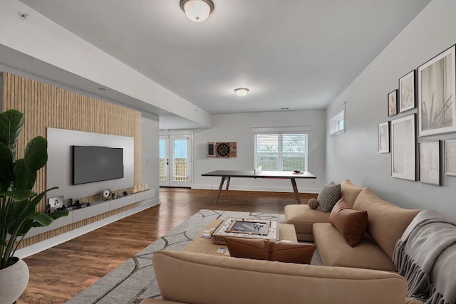 living room with dark hardwood / wood-style floors