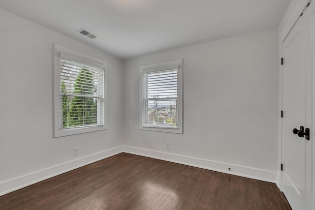 empty room featuring hardwood / wood-style floors