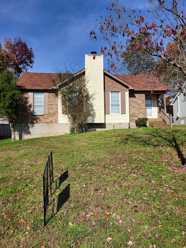 ranch-style house with a front yard