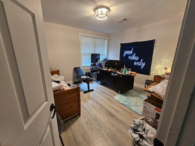 office space featuring light wood-type flooring