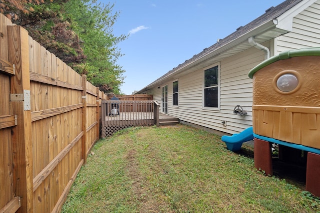 view of yard featuring a deck