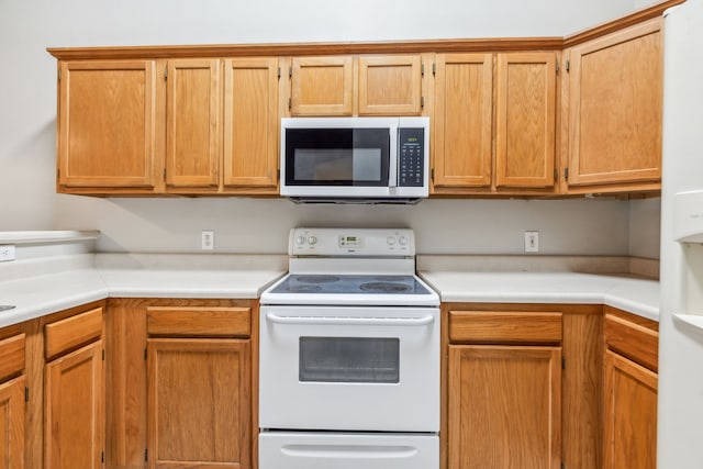 kitchen featuring white appliances