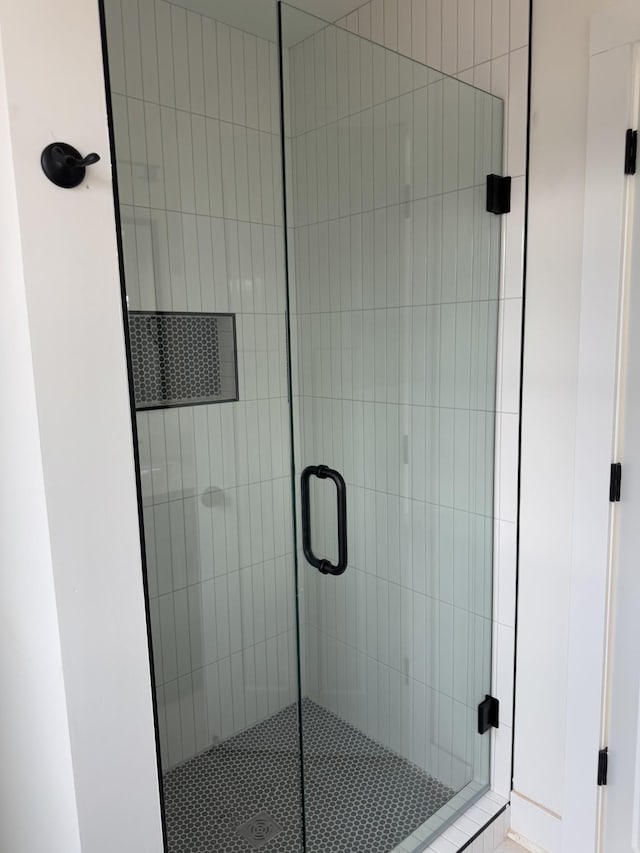 bathroom featuring walk in shower