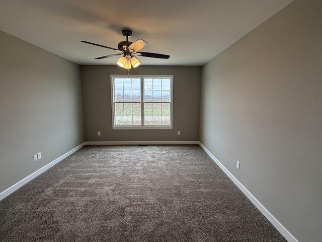 spare room with carpet flooring and ceiling fan