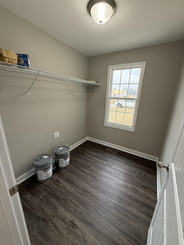 washroom featuring dark wood-type flooring