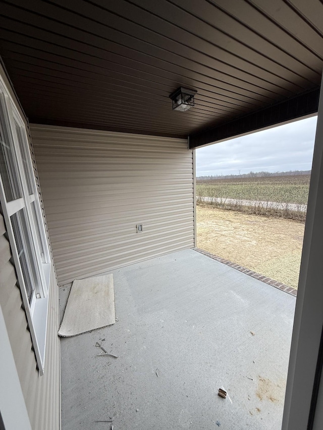 view of patio / terrace featuring a rural view