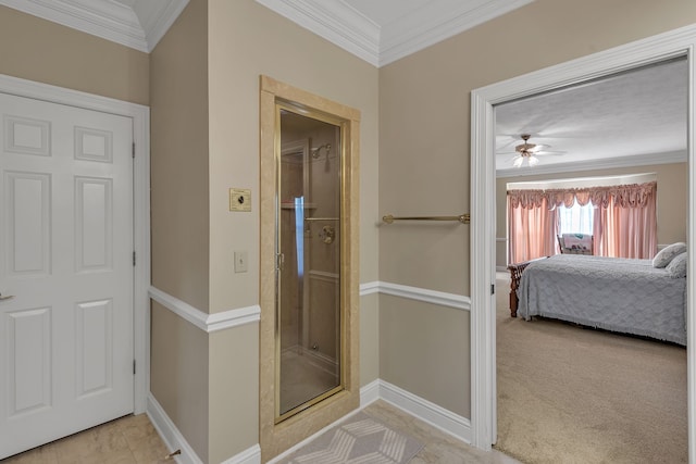 bathroom with crown molding, ceiling fan, and an enclosed shower