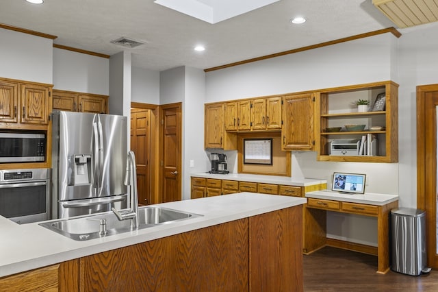 kitchen with a textured ceiling, crown molding, dark hardwood / wood-style floors, and appliances with stainless steel finishes