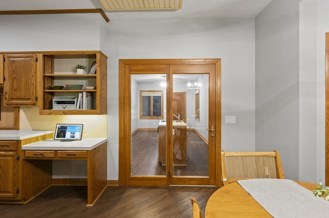 interior space featuring dark hardwood / wood-style flooring and a textured ceiling