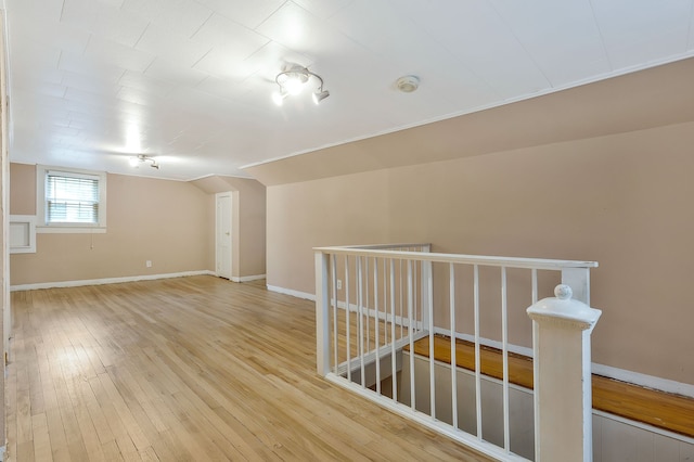 bonus room featuring wood-type flooring