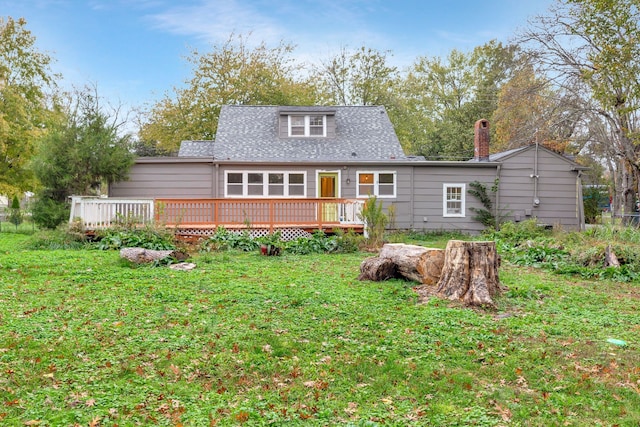 rear view of house with a wooden deck