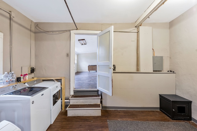 laundry room featuring dark hardwood / wood-style flooring, independent washer and dryer, and electric panel