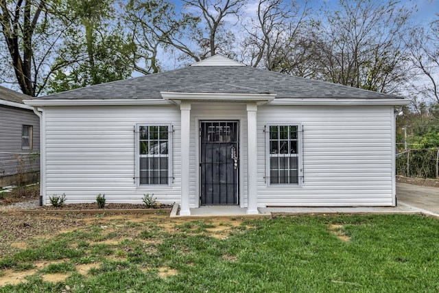 exterior space with a front lawn