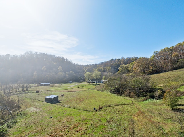 property view of mountains featuring a rural view