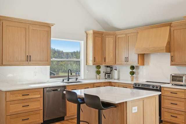 kitchen featuring sink, stainless steel dishwasher, lofted ceiling, electric stove, and a kitchen island