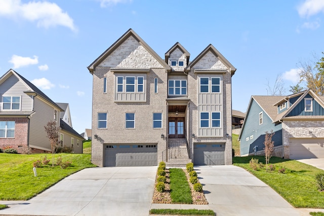 view of front of property featuring a garage, a front yard, and french doors