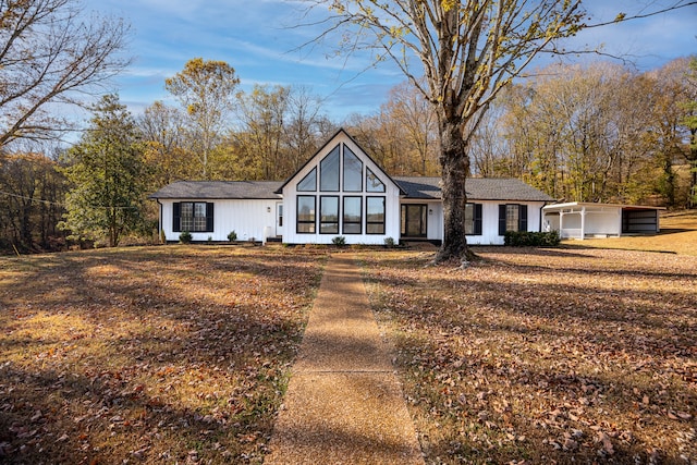 view of front facade with a carport