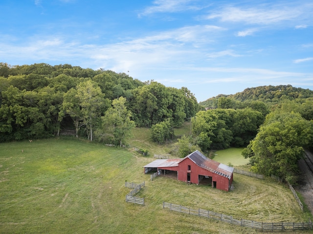 birds eye view of property featuring a rural view