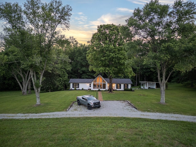 view of front of house featuring a lawn