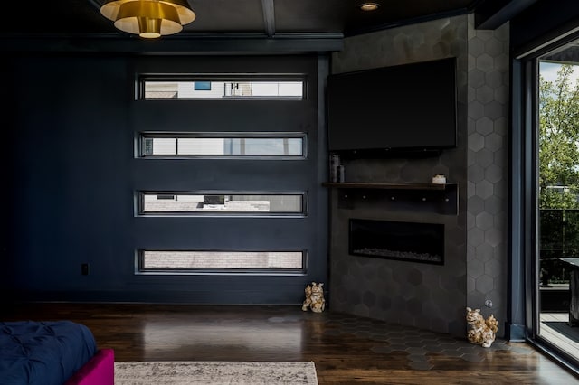 entryway featuring dark hardwood / wood-style floors and crown molding