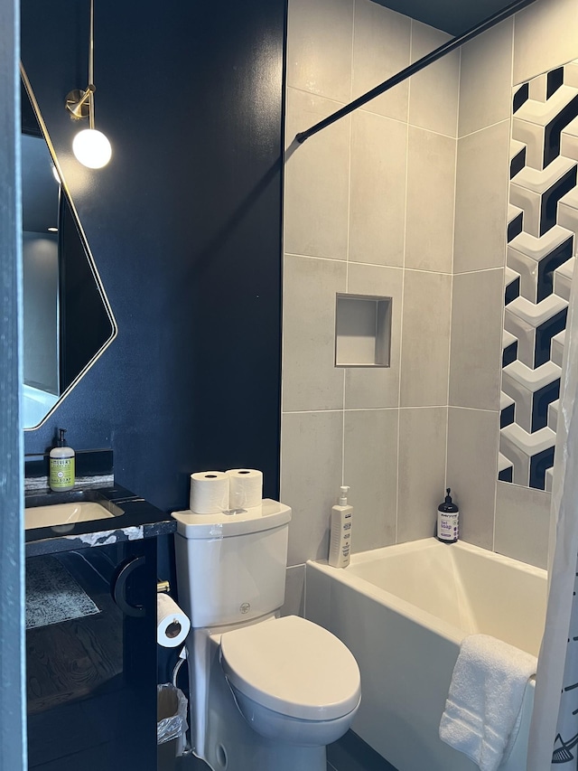 bathroom featuring vanity, toilet, and shower / bathtub combination with curtain