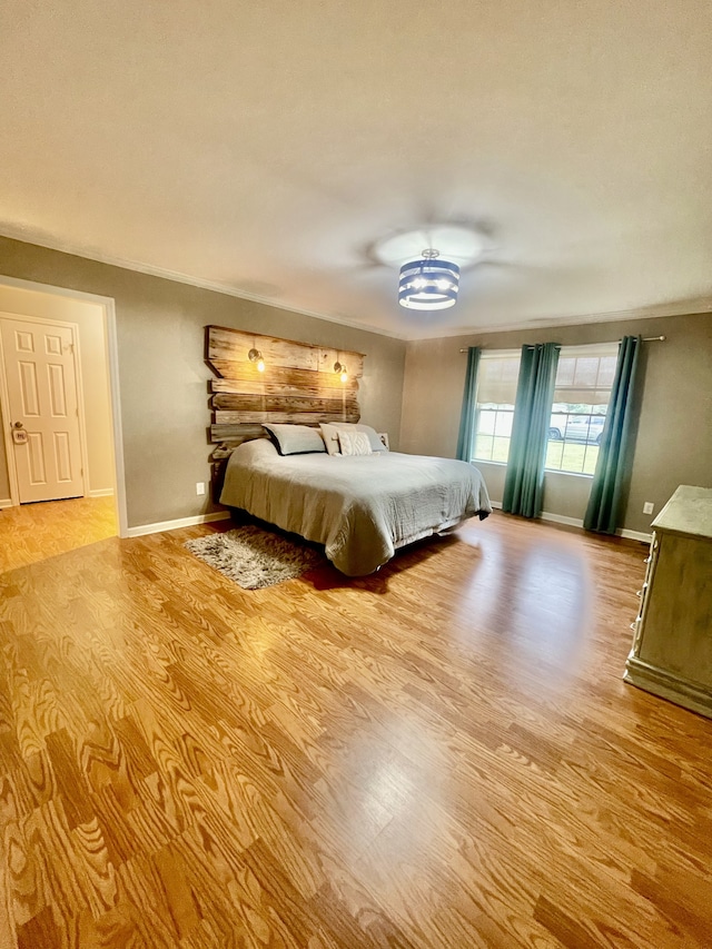 unfurnished bedroom with light wood-type flooring