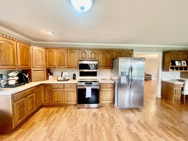 kitchen with light hardwood / wood-style flooring, stainless steel appliances, and ornamental molding