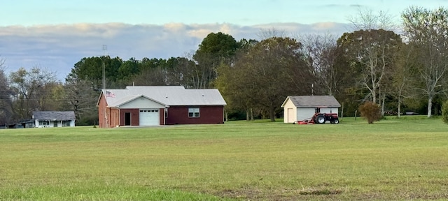 view of yard with a garage