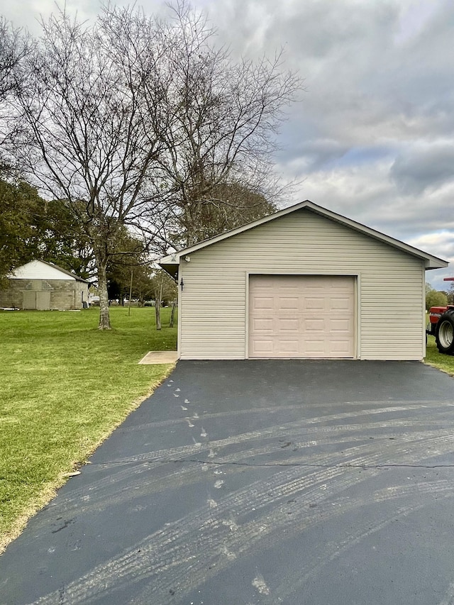 garage with a lawn