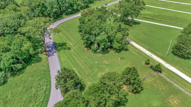 birds eye view of property with a rural view