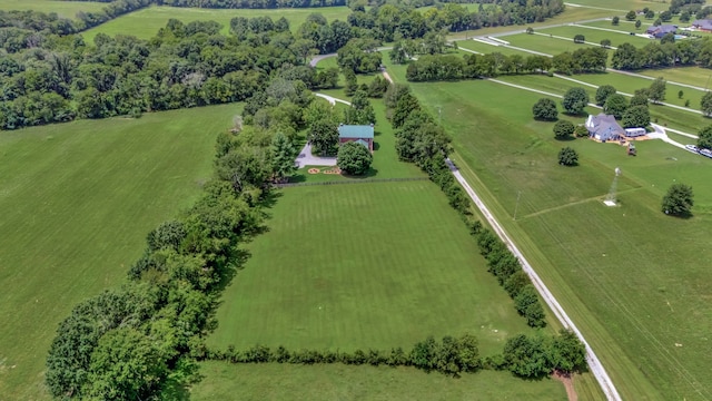 birds eye view of property featuring a rural view