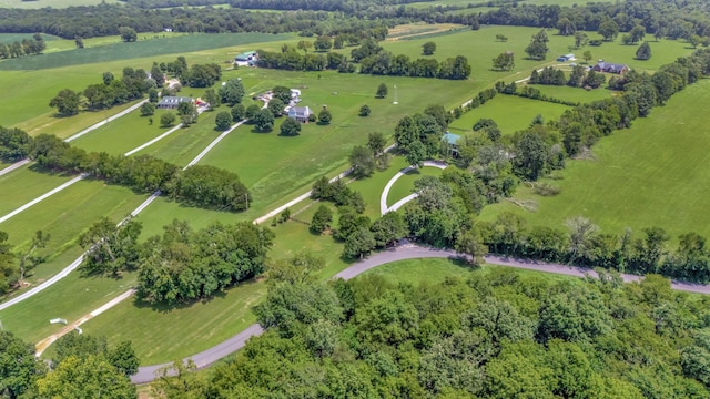 birds eye view of property with a rural view