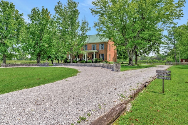 view of front facade with a front yard