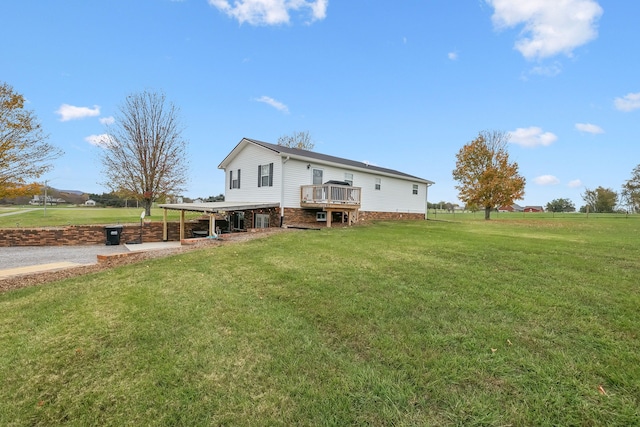 exterior space with a deck and a yard