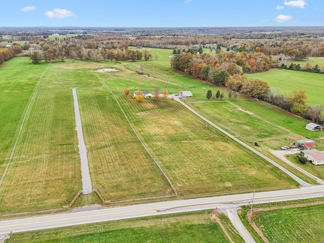 birds eye view of property featuring a rural view