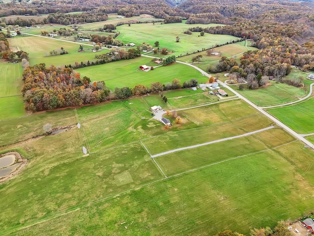 birds eye view of property featuring a rural view