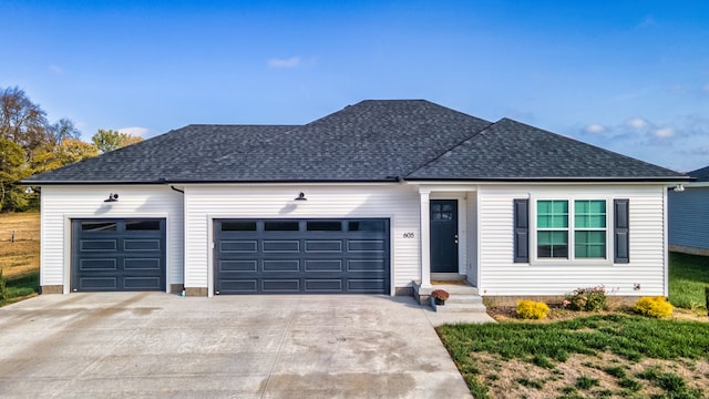 view of front of home featuring a garage