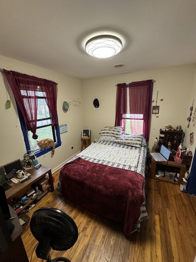 bedroom featuring hardwood / wood-style floors