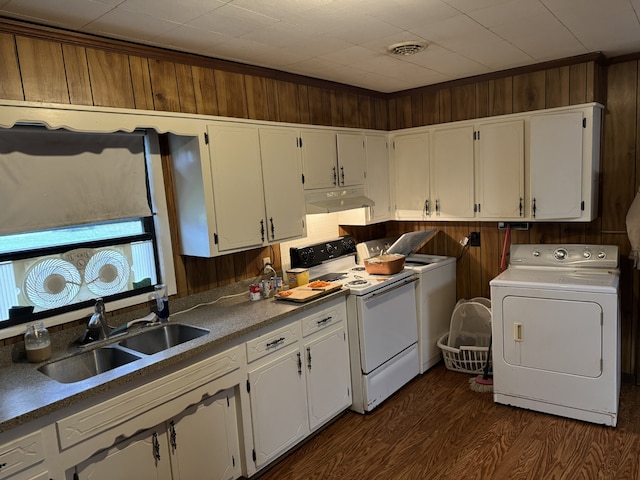 kitchen featuring white cabinets, washer / dryer, electric range, and sink