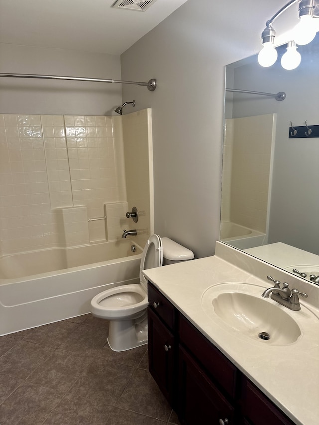 full bathroom with tile patterned flooring, vanity, toilet, and washtub / shower combination