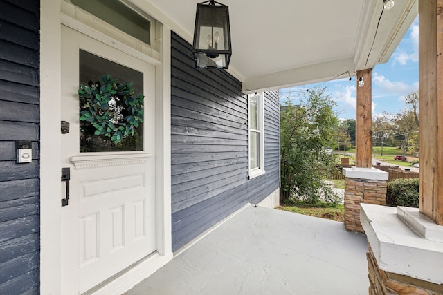 entrance to property with a porch