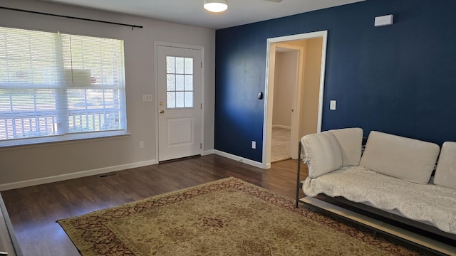 entryway featuring dark hardwood / wood-style floors and ceiling fan