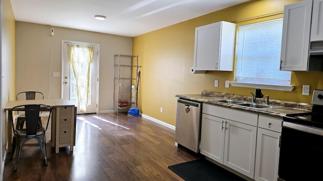 kitchen featuring range with electric stovetop, white cabinetry, sink, and dishwasher