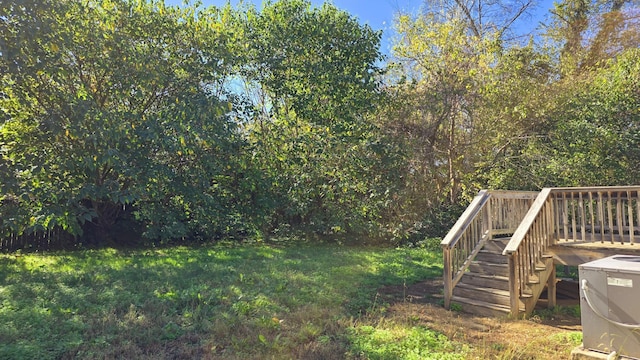 view of yard with a wooden deck