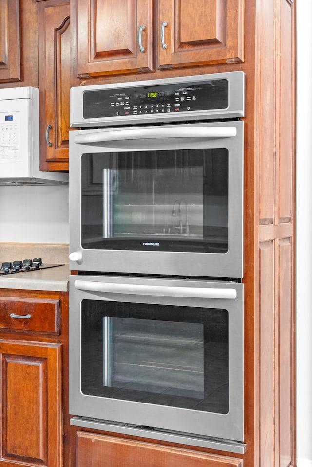 kitchen featuring gas cooktop and stainless steel double oven