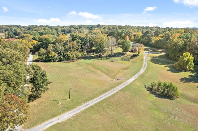 birds eye view of property featuring a rural view