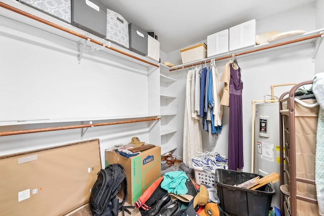 walk in closet featuring electric water heater