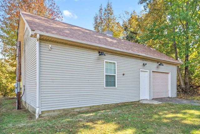 garage with a lawn