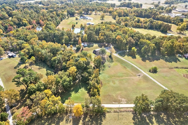 birds eye view of property featuring a rural view